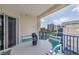 Relax on the balcony, complete with seating and views of the beach and cityscape at 5300 S Atlantic Ave # 20-507, New Smyrna Beach, FL 32169