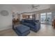 Inviting living room with an open floor plan that flows seamlessly into the kitchen and balcony at 5300 S Atlantic Ave # 20-507, New Smyrna Beach, FL 32169