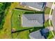 Aerial view of a home with a fenced backyard and outdoor seating area at 5607 Estero Loop, Port Orange, FL 32128