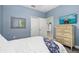 Bedroom boasting an elegant mirror and furniture plus double door closet at 5607 Estero Loop, Port Orange, FL 32128