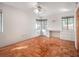 Bedroom featuring parquet flooring, built in desk and ample natural light at 600 Magnolia St, New Smyrna Beach, FL 32168