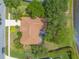 Overhead view featuring the home's roof, lawn, and an outdoor screened-in porch area at 6093 Sabal Creek Blvd, Port Orange, FL 32128