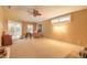 Large bonus room with carpeted floors and neutral decor great for entertaining at 6093 Sabal Creek Blvd, Port Orange, FL 32128