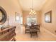 Charming dining room with decorative lighting and elegant table set at 6093 Sabal Creek Blvd, Port Orange, FL 32128
