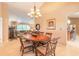 Open dining area with natural light, stylish decor, and access to living area at 6093 Sabal Creek Blvd, Port Orange, FL 32128