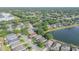 A lakefront community boasting well maintained homes, green spaces, and tranquil streets at 634 Woodford Dr, Debary, FL 32713