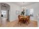 Well-lit dining area featuring a chandelier and easy access to other parts of the home at 634 Woodford Dr, Debary, FL 32713