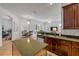 Kitchen featuring an island, stainless appliances, and seamless flow into other living spaces at 634 Woodford Dr, Debary, FL 32713