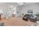 Spacious living area with an open floor plan leading to the front entrance and dining room at 634 Woodford Dr, Debary, FL 32713