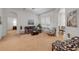 Comfortable living area with a neutral palette and seamless flow to the dining space at 634 Woodford Dr, Debary, FL 32713