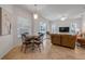 Living Space with a kitchen and dining area that provides seamless indoor and outdoor living at 634 Woodford Dr, Debary, FL 32713