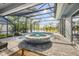 Sun-drenched pool and spa are perfect for unwinding with a stunning view at 634 Woodford Dr, Debary, FL 32713