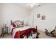 Comfortable bedroom with a ceiling fan, complemented by decorative furniture and ample natural light at 6436 Longlake Dr, Port Orange, FL 32128