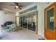 Outdoor patio offers dining space and sliding glass doors, perfect for entertaining at 6436 Longlake Dr, Port Orange, FL 32128