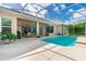 Outdoor patio featuring a sparkling pool and comfortable seating, ideal for entertaining at 6436 Longlake Dr, Port Orange, FL 32128