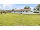 The expansive backyard is an outdoor haven, great for relaxing and entertaining at 701 West St, New Smyrna Beach, FL 32168