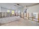 Spacious garage featuring exposed wall studs, ready for customization and finishing touches at 701 West St, New Smyrna Beach, FL 32168
