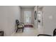 Bright and airy foyer with a decorative door and tile flooring at 703 Volco Rd, Edgewater, FL 32141