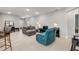 Large living room with tile floors, featuring seating area at 703 Volco Rd, Edgewater, FL 32141