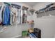 Organized walk-in closet with shelving and hanging space for clothes, bags, and accessories at 703 Volco Rd, Edgewater, FL 32141