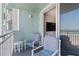 Relaxing balcony with seating offering ocean views and a pleasant outdoor space at 705 N Atlantic Ave # 4030, New Smyrna Beach, FL 32169