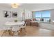 Inviting living space with water views, a marble table, and modern furnishings at 705 N Atlantic Ave # 4030, New Smyrna Beach, FL 32169
