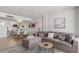Spacious living room flowing into a modern kitchen, complete with comfortable seating at 705 N Atlantic Ave # 4030, New Smyrna Beach, FL 32169