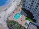 The pool is a quick walk from the beach and offers lounge chairs and a lush landscape at 705 N Atlantic Ave # 4030, New Smyrna Beach, FL 32169