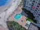 The pool is a quick walk from the beach and offers lounge chairs and a lush landscape at 705 N Atlantic Ave # 4030, New Smyrna Beach, FL 32169