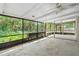 Large screened lanai with ample space to entertain at 795 Sugar Cane Ln, Port Orange, FL 32129
