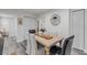 Elegant dining room with a wood table and modern decor, offering a perfect space for meals at 801 Canal St, New Smyrna Beach, FL 32168