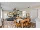 Open floor plan showing dining area, living room, and access to other rooms at 801 Canal St, New Smyrna Beach, FL 32168