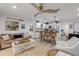 Bright living space showcasing an open floor plan with a kitchen, dining area, and comfortable seating at 801 Canal St, New Smyrna Beach, FL 32168