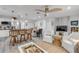 Spacious living area combining a kitchen, dining space, and a cozy seating area for modern living at 801 Canal St, New Smyrna Beach, FL 32168