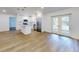 Bright, open-concept kitchen with island, stainless appliances and modern white cabinetry at 808 Rosalia Dr, Sanford, FL 32771