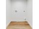 A laundry room with hookups and hardwood floors at 808 Rosalia Dr, Sanford, FL 32771