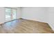 Bright living room with stylish floors and a door to the backyard at 808 Rosalia Dr, Sanford, FL 32771