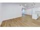 Open living space featuring wood floors and an open layout to the kitchen at 808 Rosalia Dr, Sanford, FL 32771