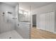 Beautiful walk-in shower and double doors to a separate toilet at 1100 Loch Linnhe Ct, New Smyrna Beach, FL 32168