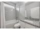 Stylish bathroom with subway tile, granite countertop, and modern fixtures in a neutral color scheme at 1100 Loch Linnhe Ct, New Smyrna Beach, FL 32168