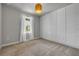 Cozy bedroom featuring natural light from the window and a decorative wall panel at 1100 Loch Linnhe Ct, New Smyrna Beach, FL 32168
