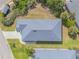 Birds-eye view shows the roof and layout of the house at 1100 Loch Linnhe Ct, New Smyrna Beach, FL 32168