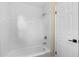 Clean bathroom with white subway tile surround in the bathtub and shower, offering a modern and simple style at 1364 W Hartley Cir, Deltona, FL 32725