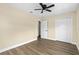 Bedroom with new vinyl floors and a ceiling fan at 1364 W Hartley Cir, Deltona, FL 32725