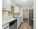 Modern kitchen featuring new appliances, light counter tops and new cabinets at 1364 W Hartley Cir, Deltona, FL 32725