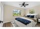 Main bedroom with bright windows and new vinyl flooring at 1364 W Hartley Cir, Deltona, FL 32725
