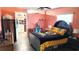 Inviting bedroom featuring walk-in closet, and a desk at 2530 Tamarind Dr, Edgewater, FL 32141