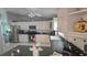Bright kitchen featuring white cabinets, stainless steel appliances, and neutral countertops at 2530 Tamarind Dr, Edgewater, FL 32141