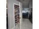 Walk-in pantry with wire shelving, showcasing ample storage space at 2530 Tamarind Dr, Edgewater, FL 32141