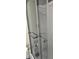 Modern shower stall with grab bars and built-in shelving units to store toiletries at 2530 Tamarind Dr, Edgewater, FL 32141